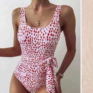 Belted one piece bathing suit